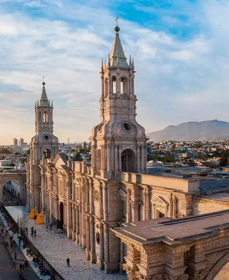 View of the Arequipa Cathedral in the Plaza de Armas, Arequipa, Peru, showcasing its stunning facade | Andean Travel Experience