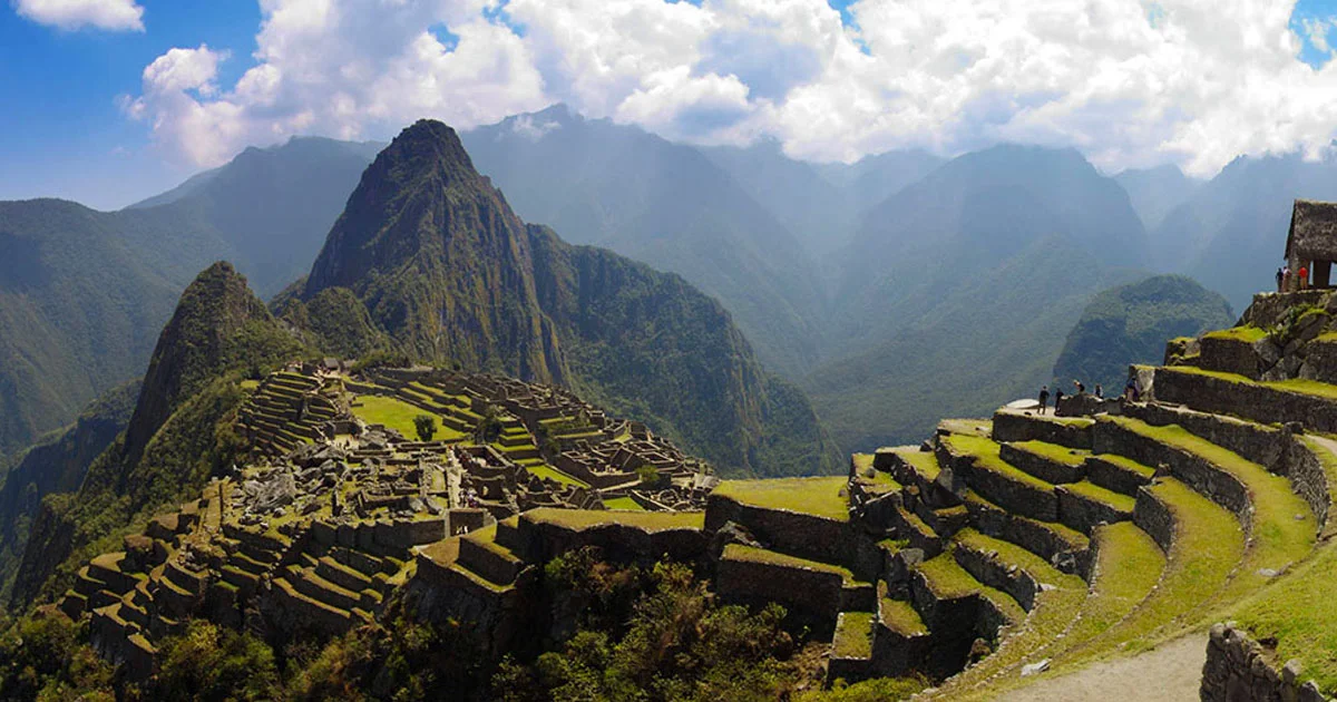 Panoramic view of Machu Picchu, the ancient Inca citadel nestled in the Peruvian Andes | Andean Travel Experience