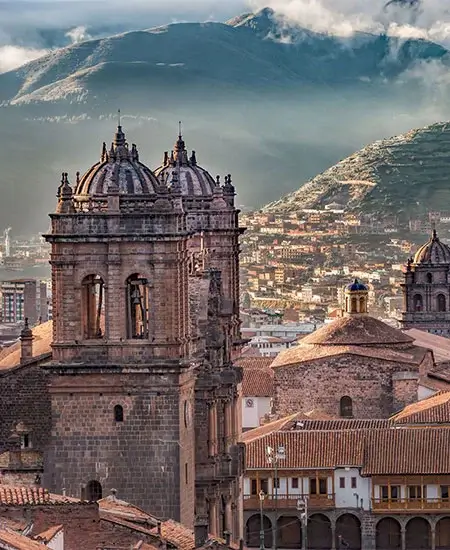 Panoramic view of the Cusco Cathedral on the Plaza de Armas, showcasing its colonial architecture in Cusco, Peru | Andean Travel Experience