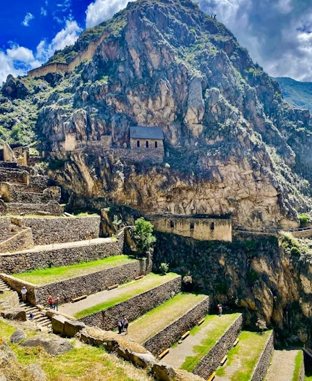 The Inca ruins of Ollantaytambo in the Sacred Valley, Peru, with its terraces and ancient fortress | Andean Travel Experience