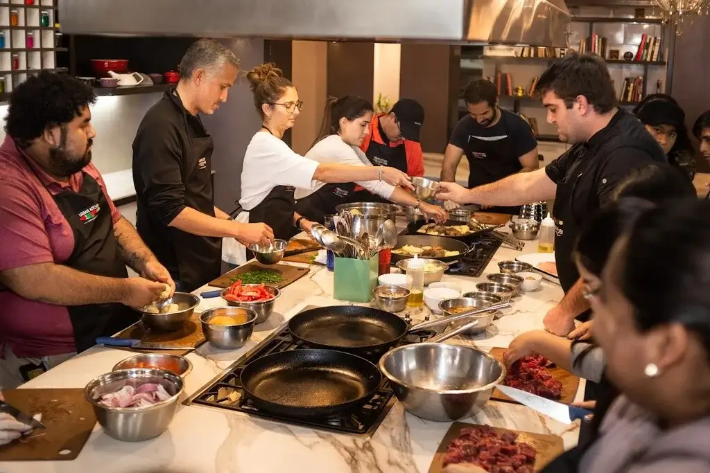 Travelers enjoying authentic Peruvian cuisine during a private cultural tour in Cusco. | Andean Travel Experience Travelers enjoying authentic Peruvian cuisine during a private cultural tour in Cusco. | Andean Travel Experience
