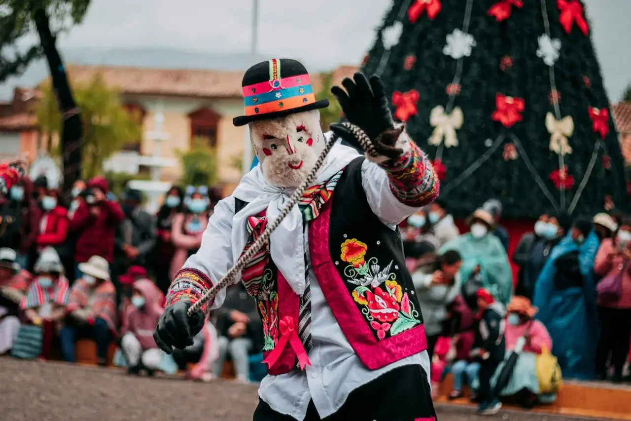 Festival dance in Cusco, Peru, with performers in traditional Inca-inspired costumes during a cultural celebration | Andean Travel Experience