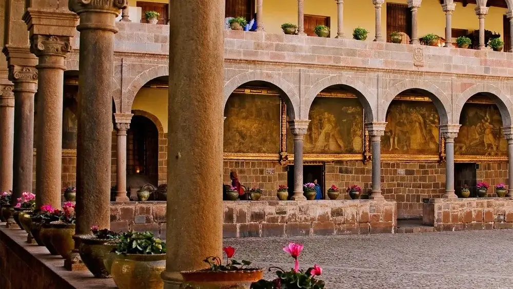 Stone corridor inside Qoricancha Temple in Cusco with perfectly fitted Inca masonry | Andean Travel Experience