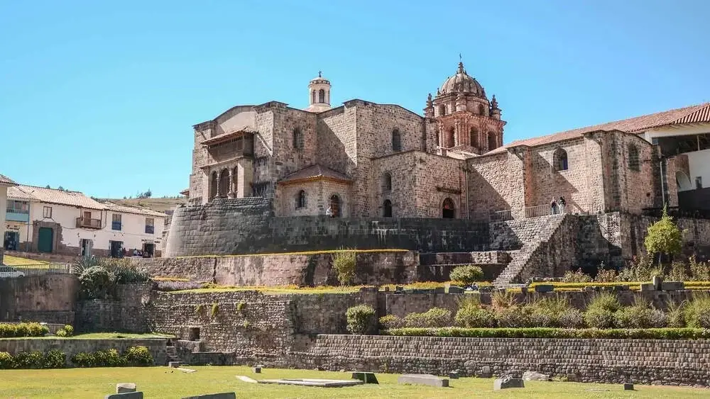 Qorikancha Temple of the Sun with Inca stone foundations and colonial church above | Andean Travel Experience