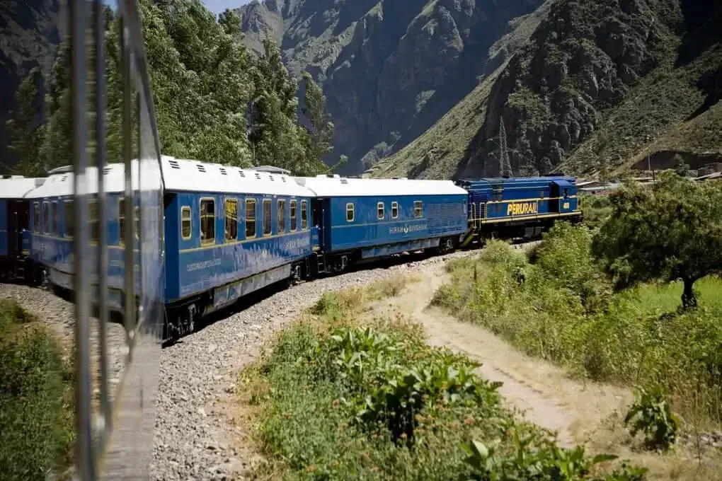 Train to Machu Picchu beautiful views, mountains green lush | Andean Travel Experience