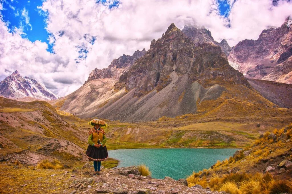 Blue lagoon at hike in andes mountains Peru | Andean Travel Experience