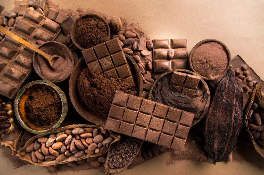Visitor learning to make artisanal Peruvian chocolate from cacao beans in a Cusco workshop | Andean Travel Experience