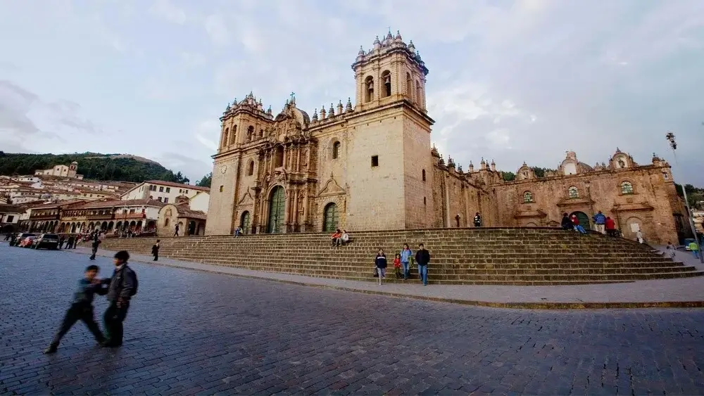 Cusco Cathedral and Plaza de Armas during golden hour | Andean Travel Experience