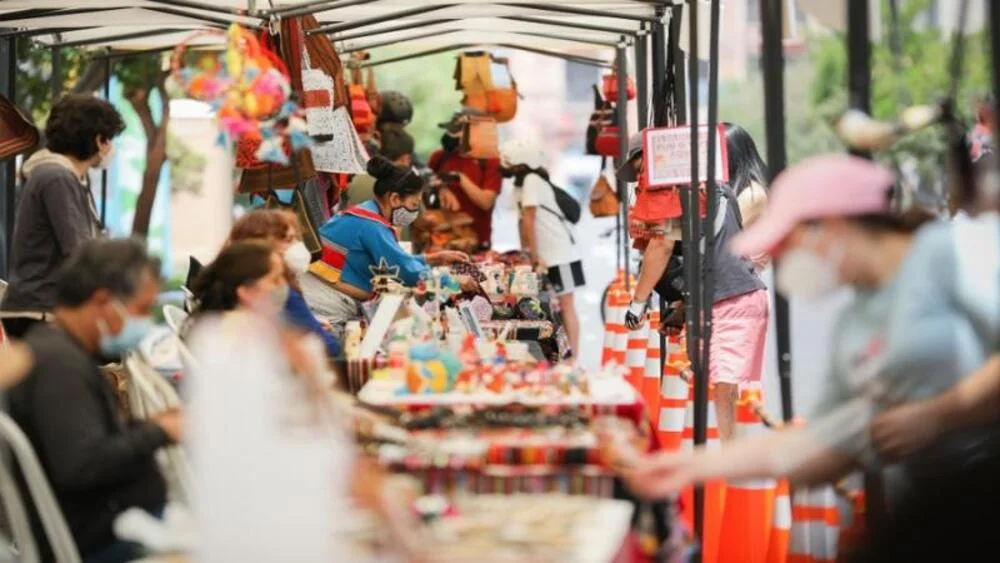 Colorful textiles and handmade souvenirs displayed at Miraflores Handicraft Market in Lima Peru | Andean Travel Experience Colorful textiles and handmade souvenirs displayed at Miraflores Handicraft Market in Lima Peru | Andean Travel Experience