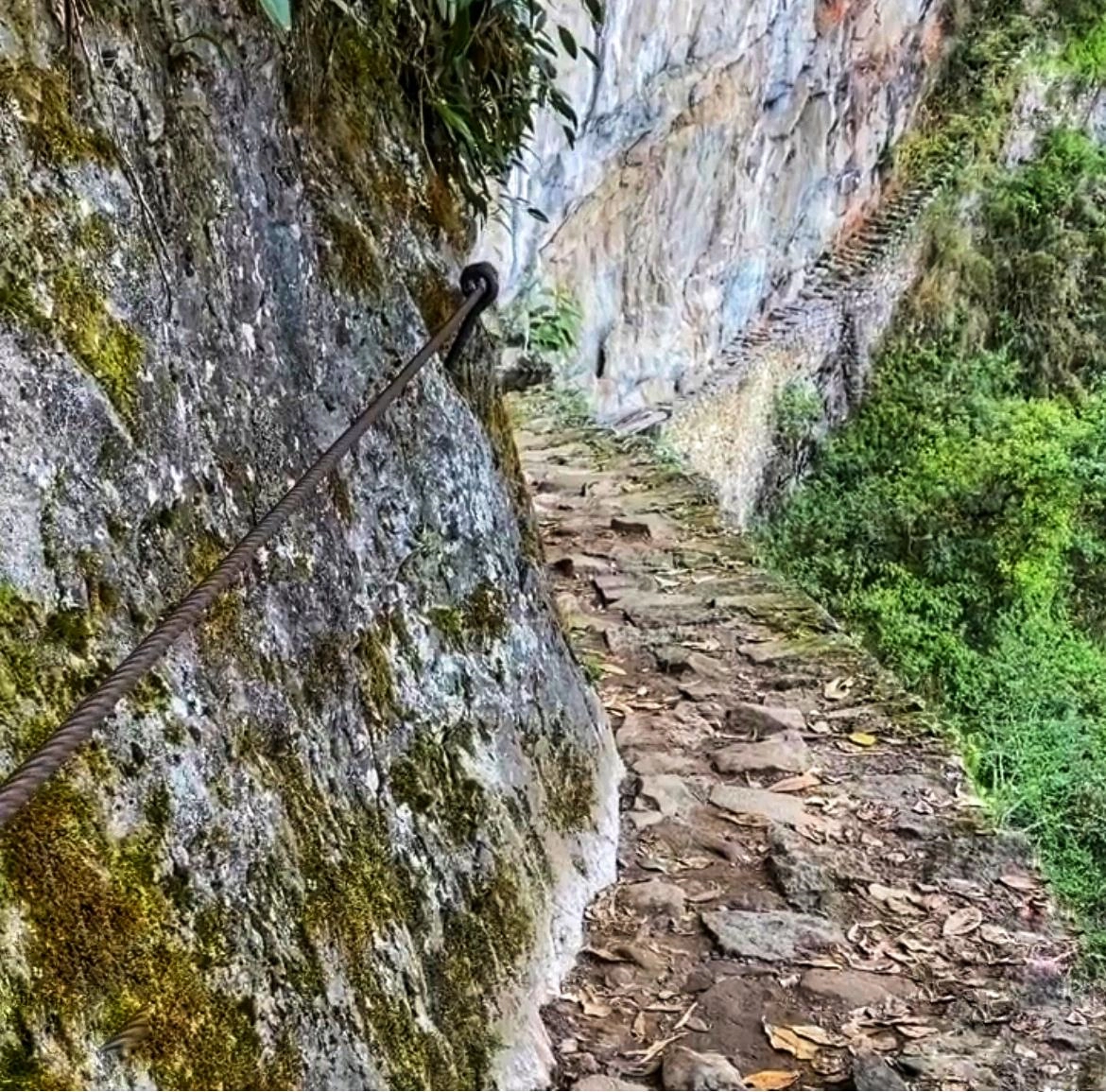 Inca Bridge at Machu Picchu, Peru – Ancient stone bridge built over a steep ravine | Andean Travel Experience