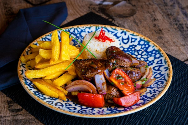 Lomo Saltado | Andean Travel Experience