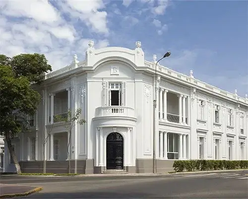 Exterior view of Hotel B in Lima, Peru, showcasing its elegant architecture and historic charm | Andean Travel Experience