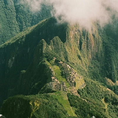 View from Machu Picchu Mountain, Peru – Breathtaking panorama of the Inca citadel and surrounding Andes | Andean Travel Experience