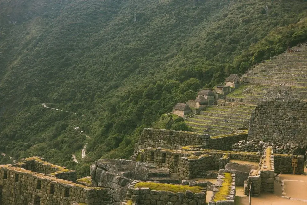 Machu Picchu Inca Ruins Homes and Stairs Green scenary | Andean Travel Experience Machu Picchu Inca Ruins Homes and Stairs Green scenary | Andean Travel Experience