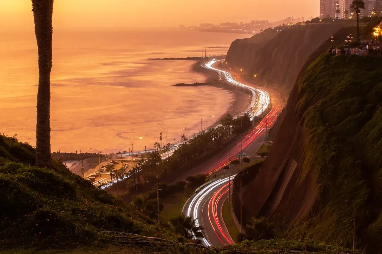 Sunset over the Costa Verde in Miraflores, Lima, Peru, with ocean views and coastal cliffs | Andean Travel Experience