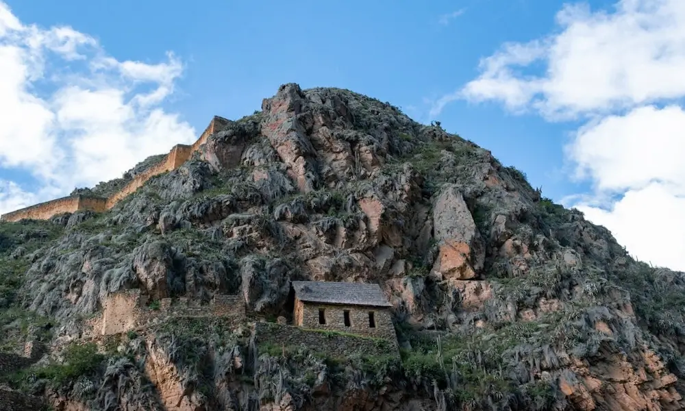 Stone remains of an Inca house built on the mountainside at Ollantaytambo, overlooking the Sacred Valley | Andean Travel Experience