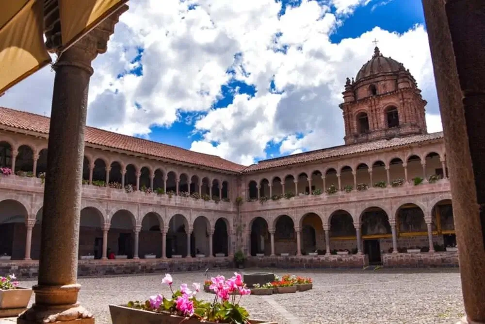 Interior of Qoricancha Temple in Cusco with finely crafted Inca stone walls and ceremonial spaces | Andean Travel Experience