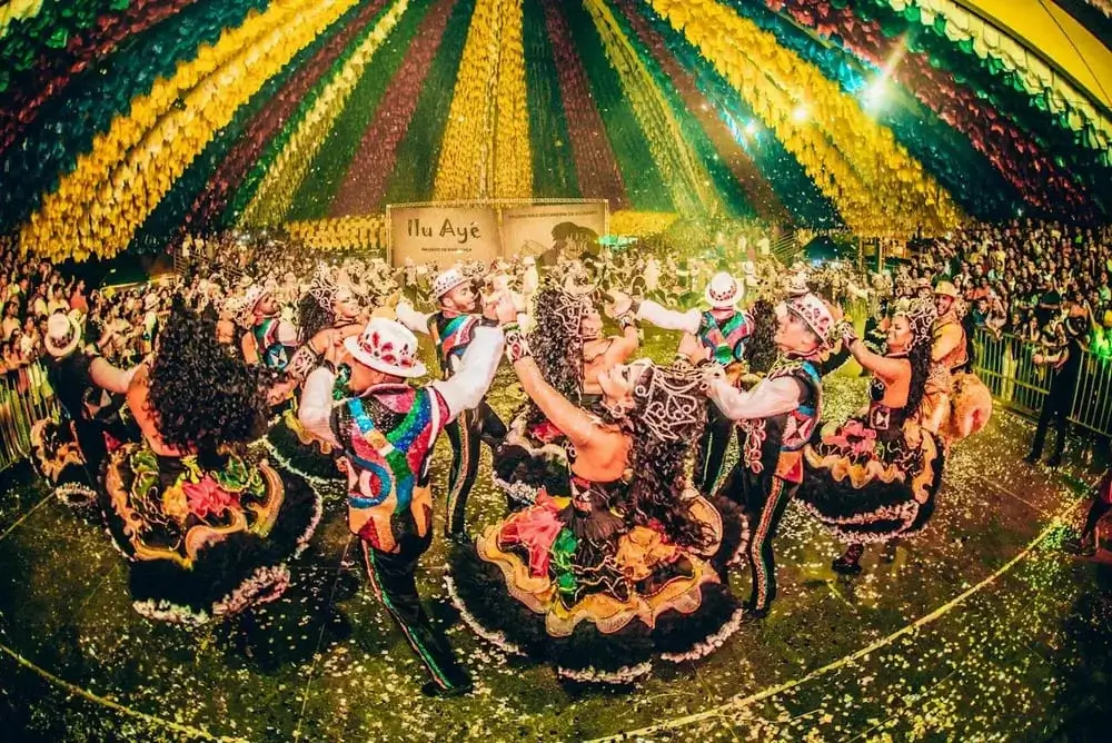 Traditional Peruvian festive dance with colorful costumes and folkloric music during a cultural celebration | Andean Travel Experience