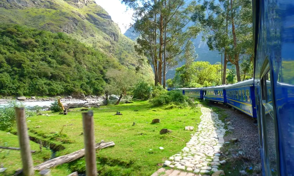 Luxury Hiram Bingham train traveling through the Sacred Valley on the route to Machu Picchu | Andean Travel Experience