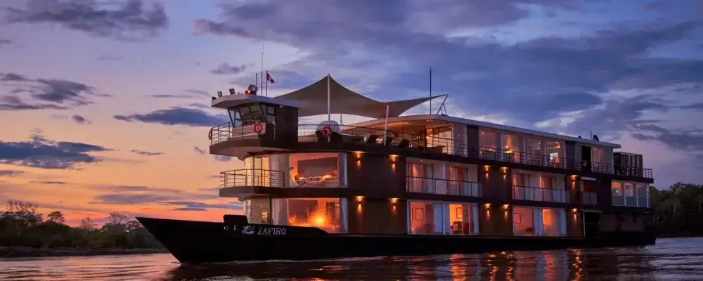 Luxury Zafiro River Cruise during golden hour in the Amazon | Andean Travel Experience