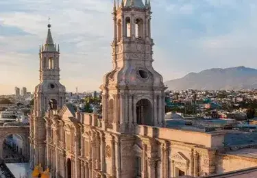 The grand facade of the Arequipa Cathedral, a historic basilica in the Plaza de Armas, Arequipa, Peru | Andean Travel Experience