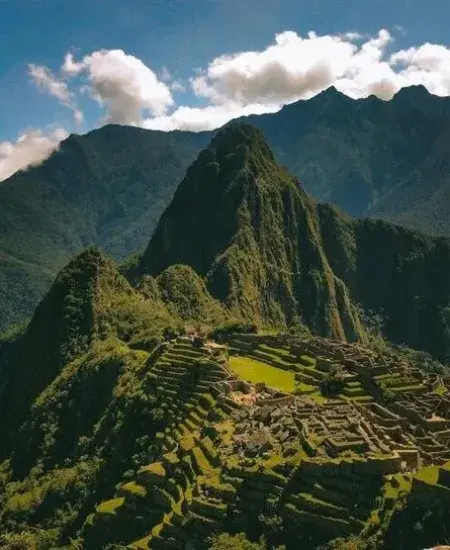 The ancient Inca ruins of Machu Picchu, nestled in the Andes Mountains | Andean Travel Experience