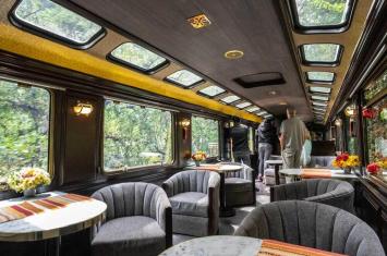 Panoramic view from inside the Vistadome train showing large windows during the journey | Andean Travel Experience