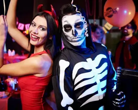 People enjoying a Halloween party | Andean Travel Experience