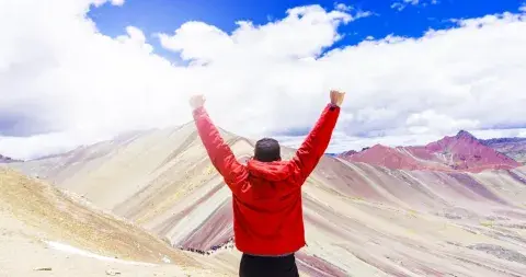 Tourist at Rainbow Mountain | Andean Travel Experience