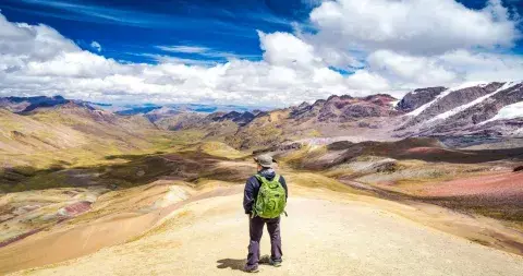 Tourist at Rainbow Mountain | Andean Travel Experience