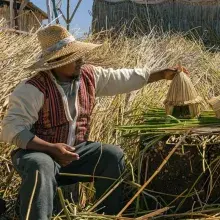Puno lake titicaca men in the uros islands | Andean Travel Experience
