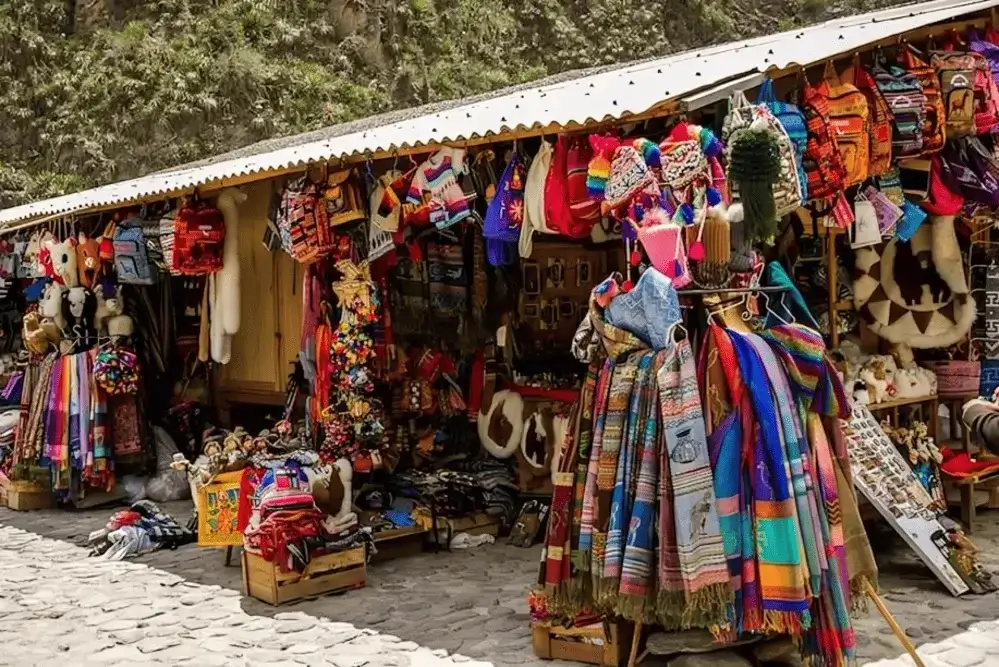 Traditional textile market in Cusco with vibrant handwoven fabrics and artisans selling colorful Andean clothing | Andean Travel Experience