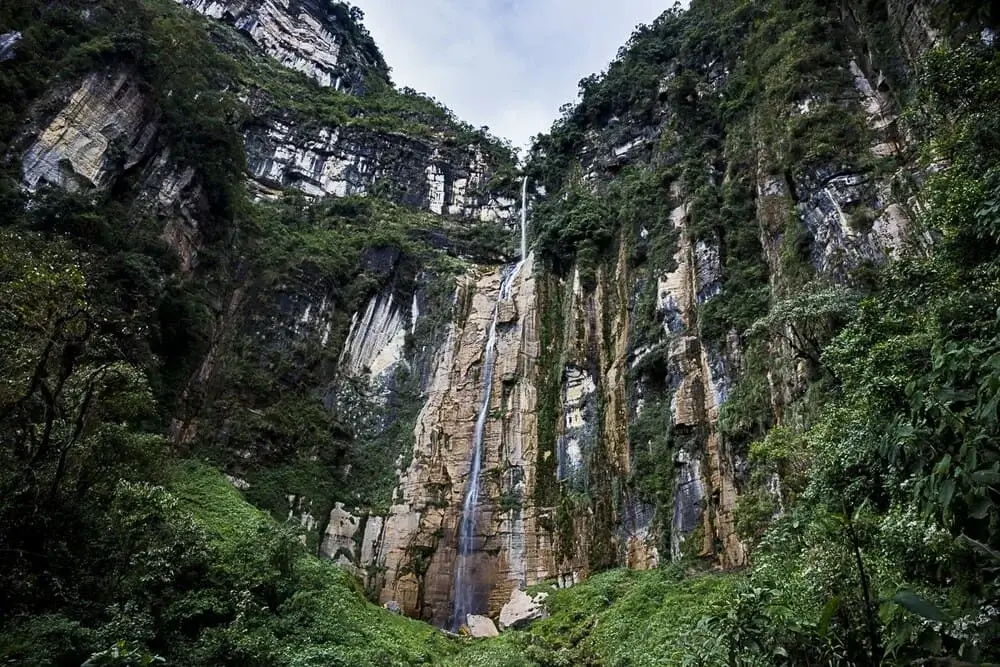 Yumbilla Falls in Amazonas, Peru, one of the tallest waterfalls in the world, cascading through dense cloud forest and surrounded by lush greenery. | Andean Travel Experience